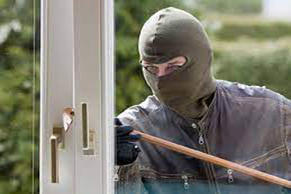 burglar-breaking-window-1